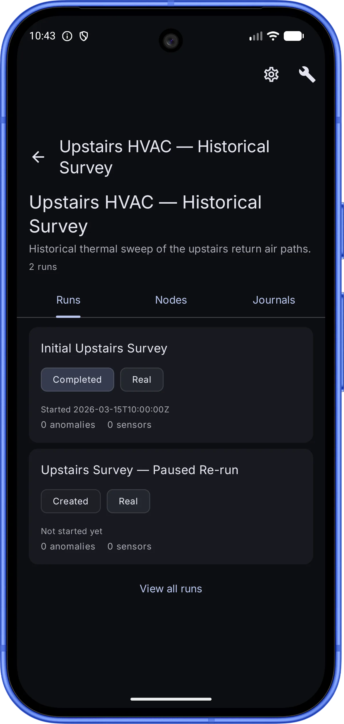 TameChaos Field on an Android phone with a Studio project associated to a local Edge server, showing the process “Upstairs HVAC — Historical Survey” — a historical thermal sweep of the upstairs return-air paths, with Runs, Nodes, and Journals tabs. The Runs tab lists two runs with status and type chips: “Initial Upstairs Survey” (Completed, Real) and “Upstairs Survey — Paused Re-run” (Created, Real), each showing its start time and anomaly and sensor counts.